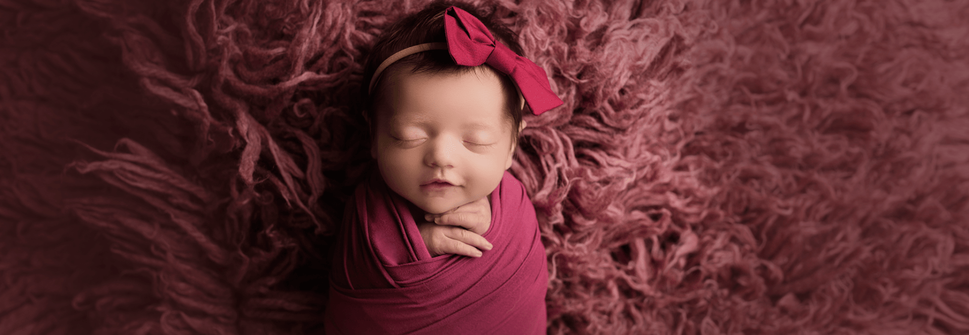 newborn in pink